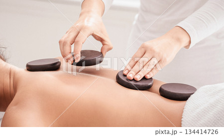 Relaxed Young Korean Lady Having Hot Stones Massage Session In Spa Salon, Lying On Table With Closed Eyes And Smiling, Beautiful Asian Female Enjoying Wellness Body Treatments, Side View, Closeup Relaxed Young Korean Lady Having Hot Stones Massage Session In Spa Salon, Lying On Table With Closed Eyes And Smiling, Beautiful Asian Female Enjoying Wellness Body Treatments, Side View, Closeup 134414726