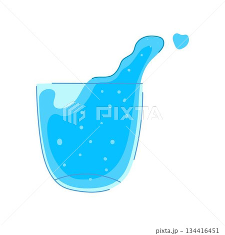 Water splashing from glass creating a heart shape drop 134416451