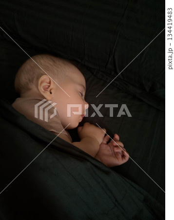 Peaceful Baby Sleeping Under Blanket Peaceful Baby Sleeping Under Blanket 134419483