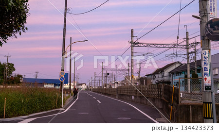 JR train with the Kasukabe townscape. Kasukabe is a special city located in Saitama Prefecture, Japan, which is one of tokyo commuter town. 134423373