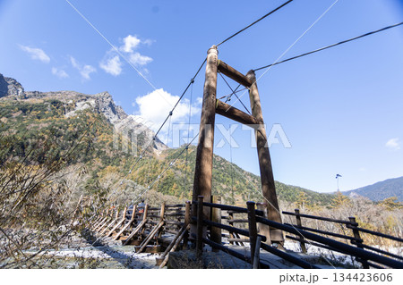Myojin bridge in front of the mount Yari in Kamikochi national park, Nagano prefecture, Japan 134423606