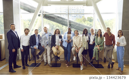 Group of happy diverse men and women meeting at professional business conference Group of happy diverse men and women meeting at professional business conference 134423679