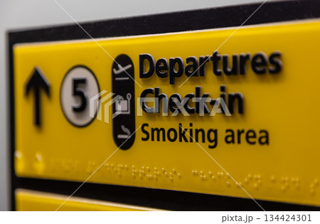 Departures Check In Elevator or Lift Sign at an Airport Departures Check In Elevator or Lift Sign at an Airport 134424301