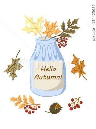 Glass jar with autumn leaves, berries and acorn arranged around with Hello Autumn text. Concept of fall season greeting, cozy natural composition and seasonal home decor 134425080