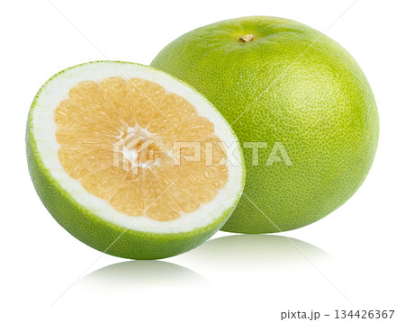 Ripe green sweetie grapefruit fruits isolated with reflections. Half of sweetie and whole sweetie isolated. 134426367