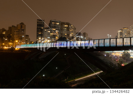 A bridge with a city skyline in the background A bridge with a city skyline in the background 134426482