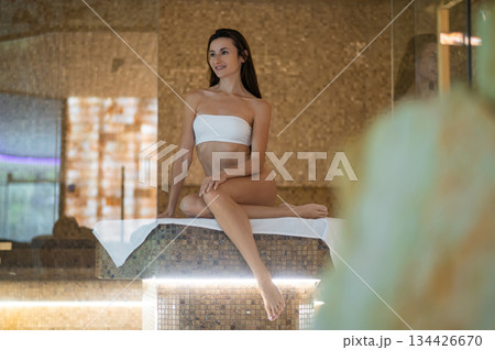 Caucasian young woman spending her time in hammam Caucasian young woman spending her time in hammam 134426670