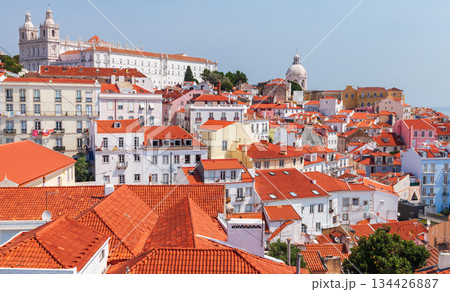 A vibrant panorama of white and pastel buildings with red tile rooftops A vibrant panorama of white and pastel buildings with red tile rooftops 134426887