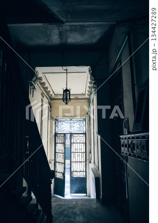 Narrow Historic Corridor with Light at the End 134427289