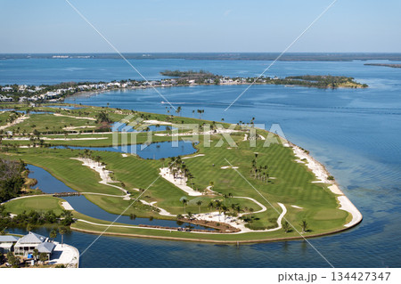 Golf course on ocean shore in southwest Florida. Seaside golfing field in Boca Grande Golf course on ocean shore in southwest Florida. Seaside golfing field in Boca Grande 134427347