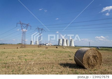 Cooling towers at nuclear power plant, energy self-sufficiency, greenhouse emission reduction and global warming concept Cooling towers at nuclear power plant, energy self-sufficiency, greenhouse emission reduction and global warming concept 134427679