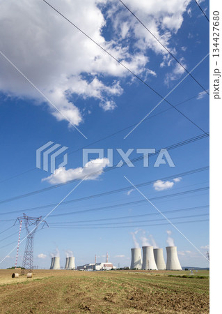 Cooling towers at nuclear power plant, energy self-sufficiency, greenhouse emission reduction and global warming concept 134427680
