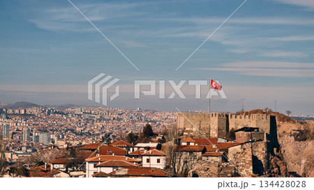 Historic Fortress with National Flag Overlooking City 134428028