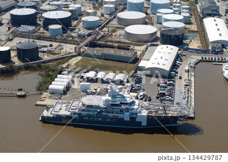 Construction shipyard for assembling of luxury yachts. Commercial dock for sea ships manufacturing Construction shipyard for assembling of luxury yachts. Commercial dock for sea ships manufacturing 134429787