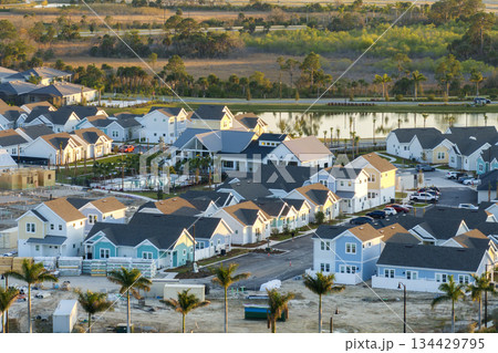 Construction in new developing suburban area. Development of residential housing in American suburbs. Real estate market in the USA 134429795