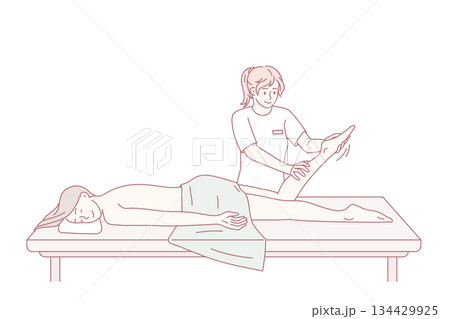 Happy client relax on table in massage saloon Happy client relax on table in massage saloon 134429925