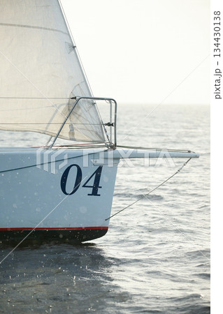 bow of a sailing boat with bowsprit at sailing regatta in the Gulf of Finland at sunny day, sailing yacht competing in a race, splashing water from under the boat, teamwork, board the boat bow of a sailing boat with bowsprit at sailing regatta in the Gulf of Finland at sunny day, sailing yacht competing in a race, splashing water from under the boat, teamwork, board the boat 134430138