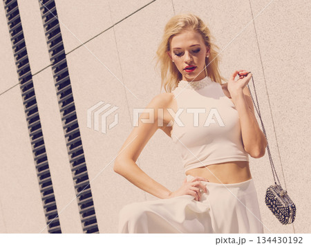 Fashionable woman in city 134430192