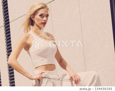 Fashionable woman in city Fashionable woman in city 134430193