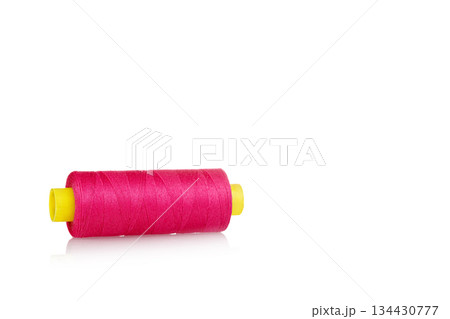 skein of thread red colors macro on a white background skein of thread red colors macro on a white background 134430777