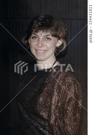 Vintage portrait of a bride after the wedding party in the evening. Retro photo from 1993. 134431811