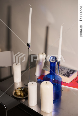 Elegant Modern Dining Setting, Tranquil Atmosphere Enhanced By Soft Lighting And Stylish Accessories 134432281