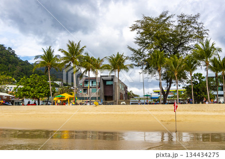 Patong Beach Phuket with people promenade sun loungers parasols Thailand. 134434275