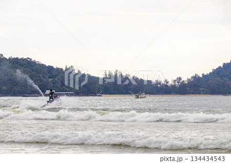 Jet ski jetski and turquoise blue water Patong Beach Thailand. Jet ski jetski and turquoise blue water Patong Beach Thailand. 134434543