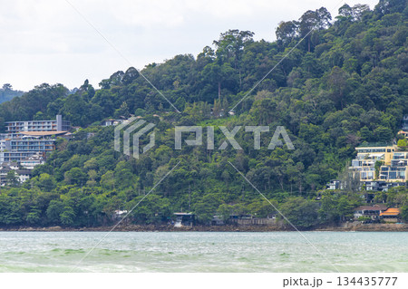 Patong Beach Phuket with turquoise blue water and mountains Thailand. 134435777