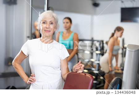 Elderly athletic woman posing in gym 134436048