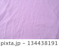 Purple fold knitted fabric background and texture.The fabric features a prominent vertical rib texture. 134438191