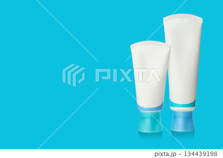 Tooth care products are shown on bright blue backdrop Tooth care products are shown on bright blue backdrop 134439198