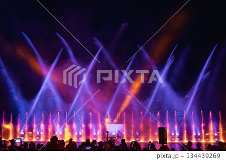 Spectacular Water Fountain Show with Colorful Lights at Night. Entertainment Concept 134439269