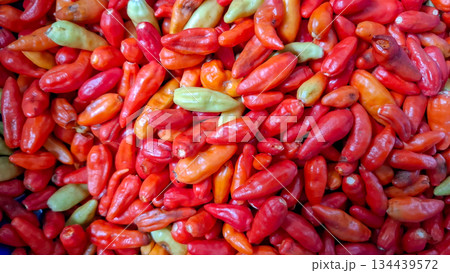 Fresh Mixed Chili Peppers Background Top View 134439572