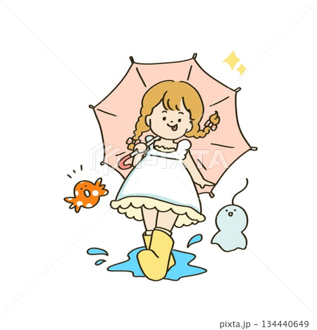 雨の日に傘をさす女の子 134440649