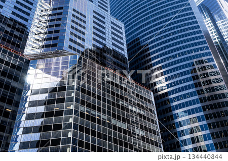 Building background. Glass building window. Architectural detail. Background of architecture. Modern glass background. Glass facade background. Architecture. Building architecture. Business district 134440844