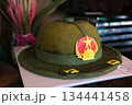 Military hat shaped cake with star and emblem in buffet at Ba Na Hills Vietnam decorated for veterans or military themed celebration dessert display. 134441458