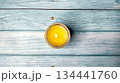Aroma candle in a glass of natural soy wax on wooden background 134441760
