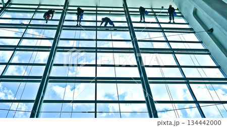 extreme work cleaning airport windows at height 134442000