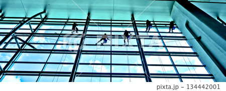 extreme work cleaning airport windows at height 134442001