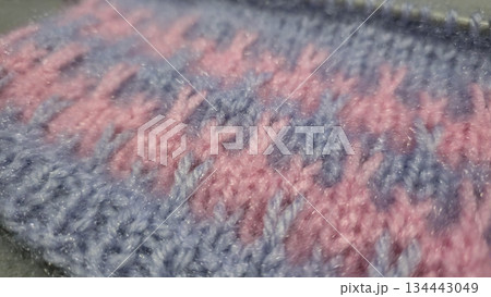 Knitting patterns and details for sweaters, hats, and other crocheted items. 134443049