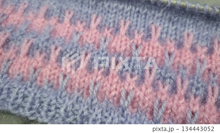 Knitting patterns and details for sweaters, hats, and other crocheted items. 134443052