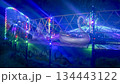 Bright neon signs and garlands Ice skating rink and winter entertainment concept 134443122