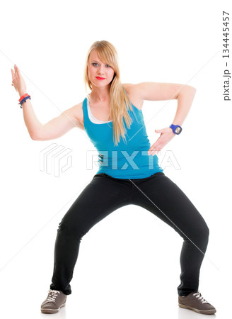 Young female in dancing pose 134445457