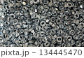 Metal nuts background for industrial and construction concept 134445470