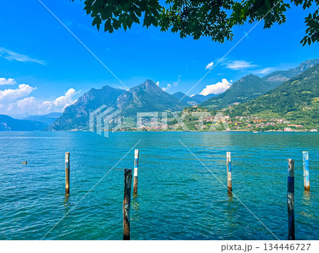 View of Iseo Lake Surrounded by Majestic Mountains and Clear Blue Skies, Italy View of Iseo Lake Surrounded by Majestic Mountains and Clear Blue Skies, Italy 134446727