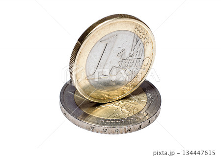 Coin of one euro to another euro coin close up Coin of one euro to another euro coin close up 134447615