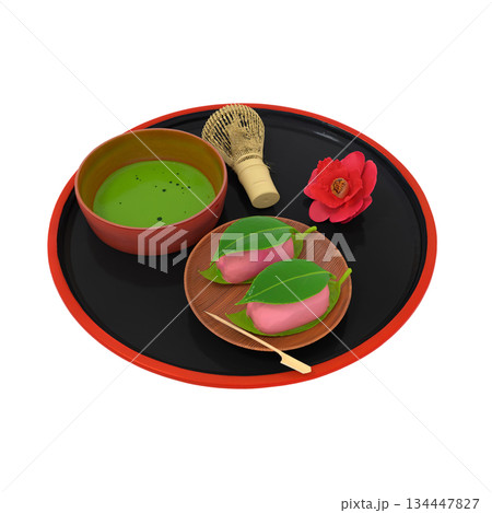 日本最古の和菓子と言われる源氏物語に載る春の和菓子である抹茶と茶筅が載った茶店やカフェの椿餅と椿の花 134447827
