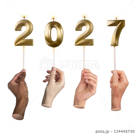 Hands holding shiny 2027 number candles expressing holiday mood, New Year celebration and excitement 134448730