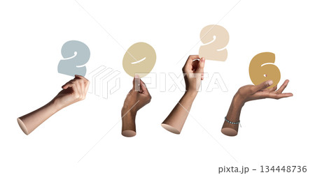 Hands of different nationalities holding pastel 2026 numbers symbolizing celebration, isolated on 134448736